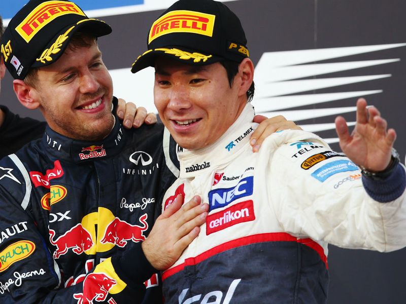 Vettel congratulates Kobayashi on his first F1 podium finish