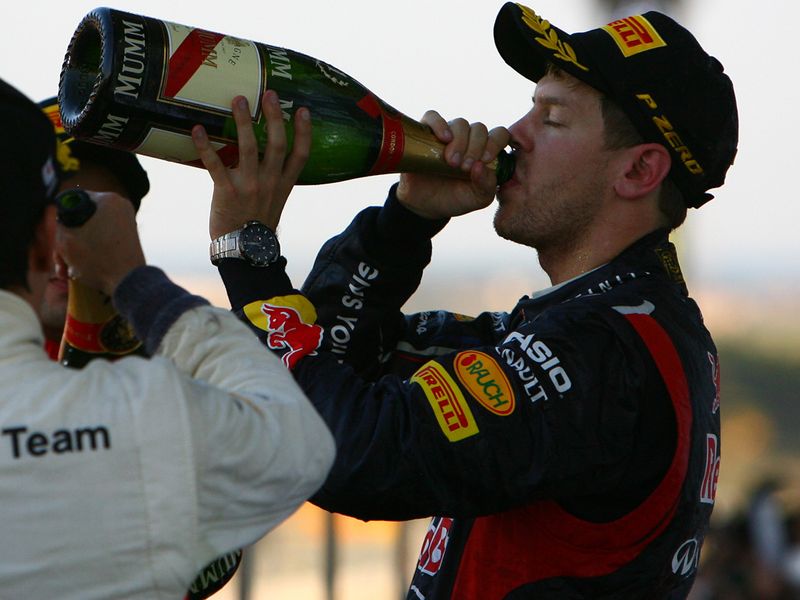 A delighted Sebastian Vettel on the podium