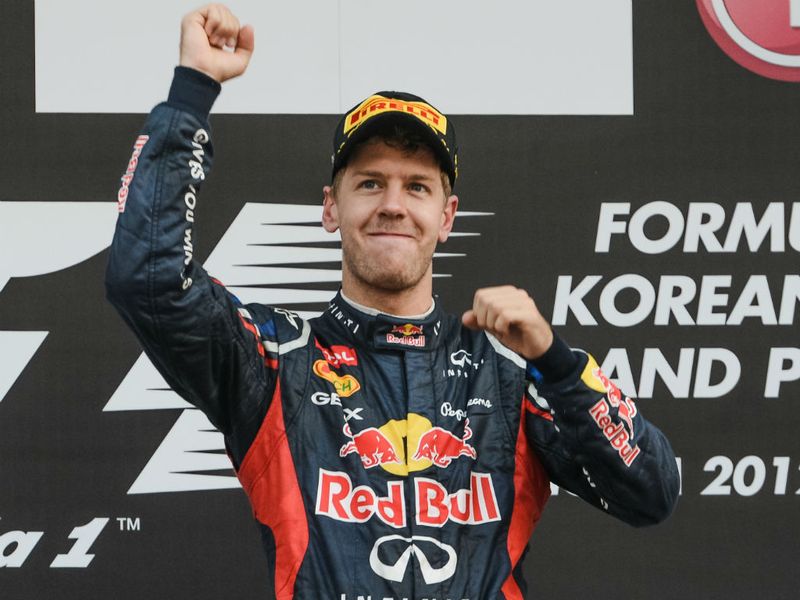 Vettel takes the title lead with four races remaining