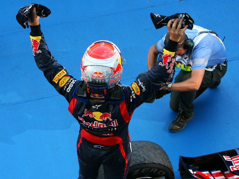 Vettel celebrates in parc ferme