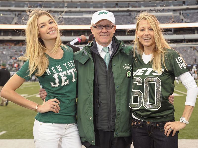Jets owner Woody Johnson (C) is pictured with his wife (R) and model Jessica Hart (L)