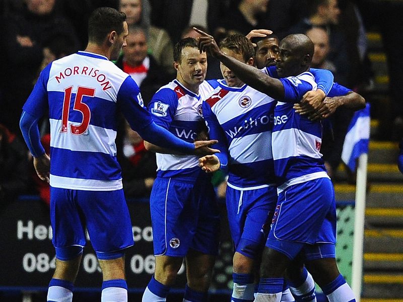 Jason Roberts celebrates with his Reading team-mates after scoring the Royals' opener as they took the upper hand.