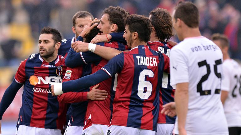 Manolo Gabbiadini is mobbed after his goal