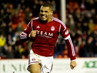 Josh Magennis: To stay at Pittodrie for the next 12 months.