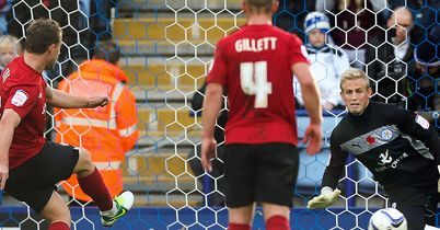 Simon Cox: Sends Kasper Schmeichel the wrong way for equaliser