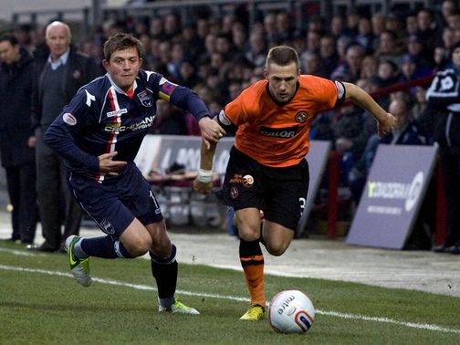 Richard Brittain tries to hold off Stuart Armstrong