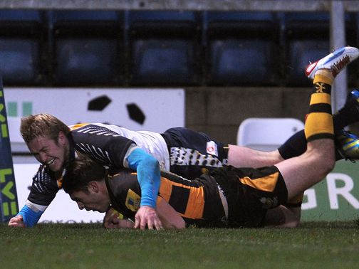 Charlie Davies dives over for a Wasps try