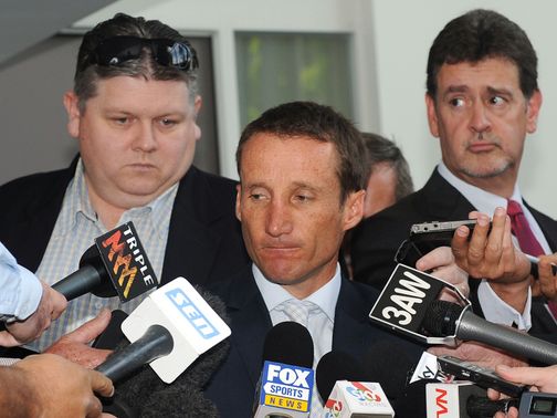 Damien Oliver faces the press after his hearing.