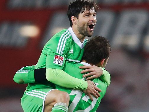 Diego and Bas Dost celebrate Wolfsburg equaliser