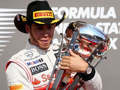 Lewis Hamilton enjoys his victory.