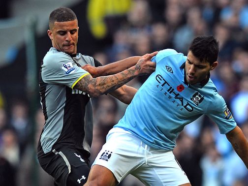 Kyle Walker and Sergio Aguero do battle
