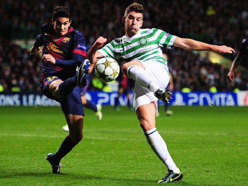Charlie Mulgrew (r) in action during the win over Barcelona