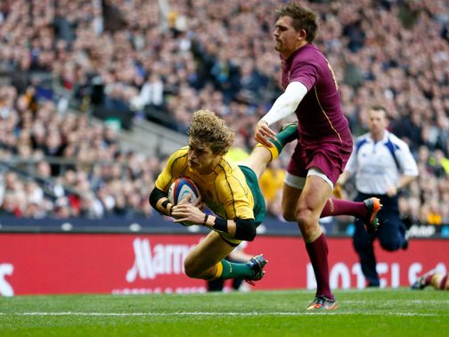 Nick Cummins scores an Australia try