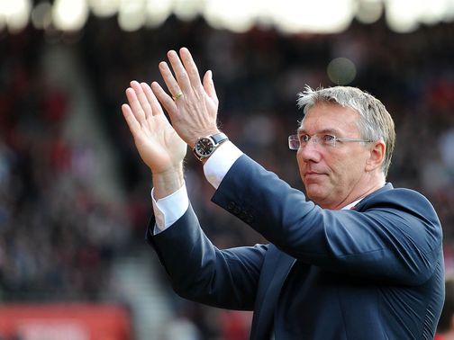 Nigel Adkins: Backed by midfielder Cork