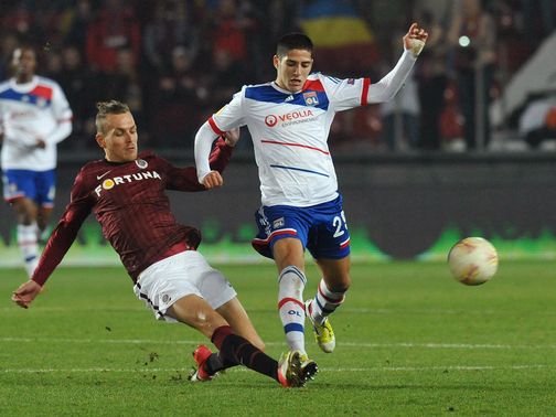 Ondrej Svejdik and Yassine Benzia battle for the ball