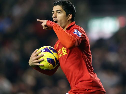 Luis Suarez celebrates his goal against Newcastle
