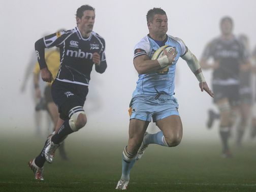 Tom May goes in for a Northampton try
