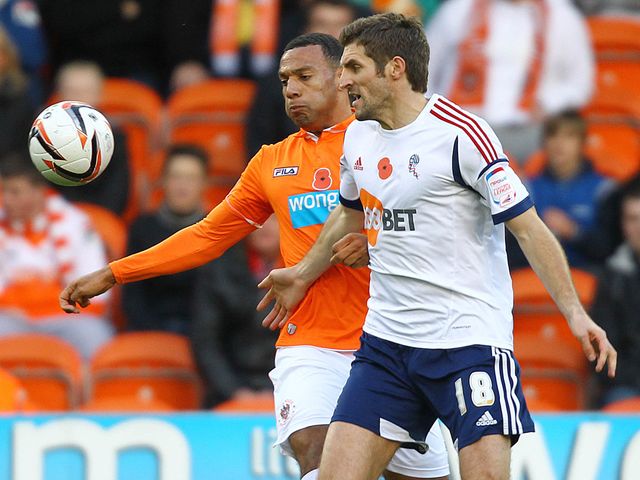 Matty Phillips and Sam Ricketts battle for the ball