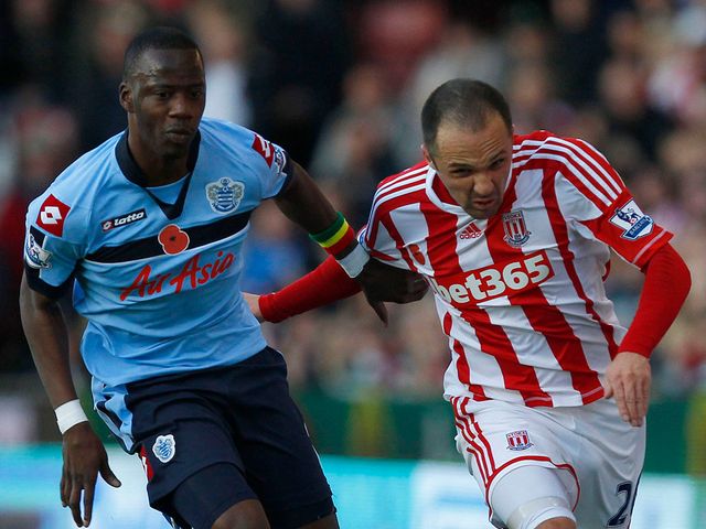 Samba Diakite and Matthew Etherington battle for the ball