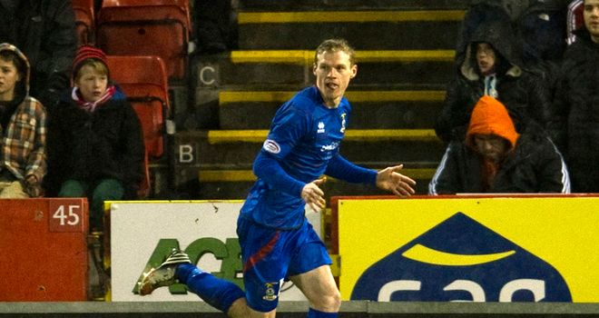 Billy McKay: Celebrates one of his goals for Caley