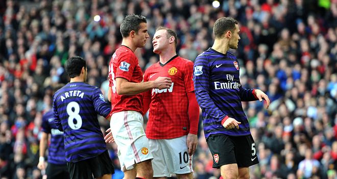 Wayne Rooney turns away in frustration after missing a penalty just before half-time