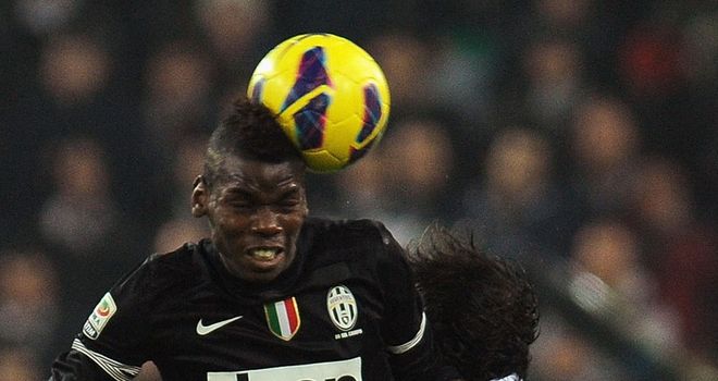 Paul Pogba outjumps Alvaro Gonzalez