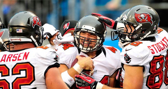 Dallas Clark: congratulated by his team-mates after scoring the game-winning touchdown