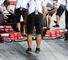 McLaren fit their new front-wing to Oliver Turvey's car