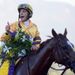 John Velazquez celebrates his Mile win on Wise Dan