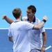 Nielsen and Marray celebrate after winning a dramatic deciding set 12-10 to delight the London crowd