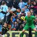 Steven Caulker gives Spurs a 21st-minute when this header creeps past City goalkeeper Joe Hart.