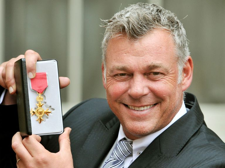 Darren Clarke with his OBE