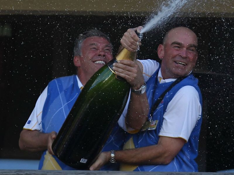 And now helping Thomas Bjorn celebrate victory in Wales.