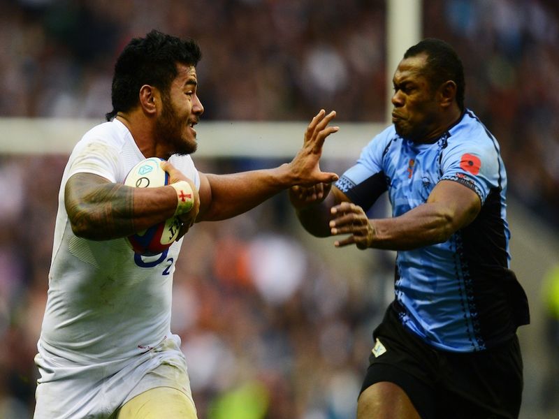 Manu Tuilagi grabbed two tries as England eased to a 54-12 victory