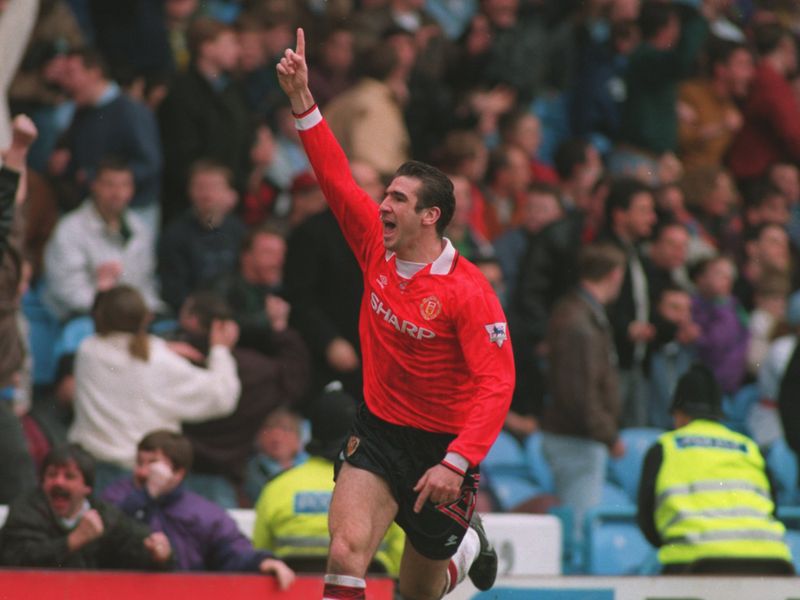 Cantona joined rivals Manchester United after just one season at Leeds. Here he celebrates scoring one of his early United goals against Manchester City.