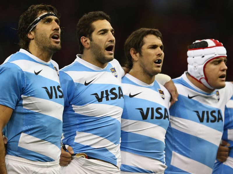 The Pumas sing the national anthem prior to kick-off