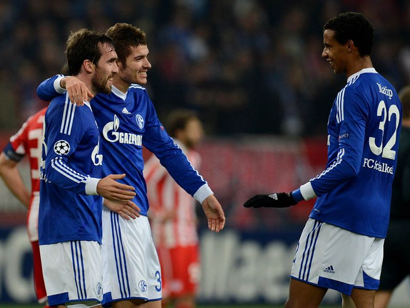 Schalke 04 join Arsenal in qualifying for the last 16, a long range effort from Christian Fuchs earns them a 1-0 win over Olympiacos.
