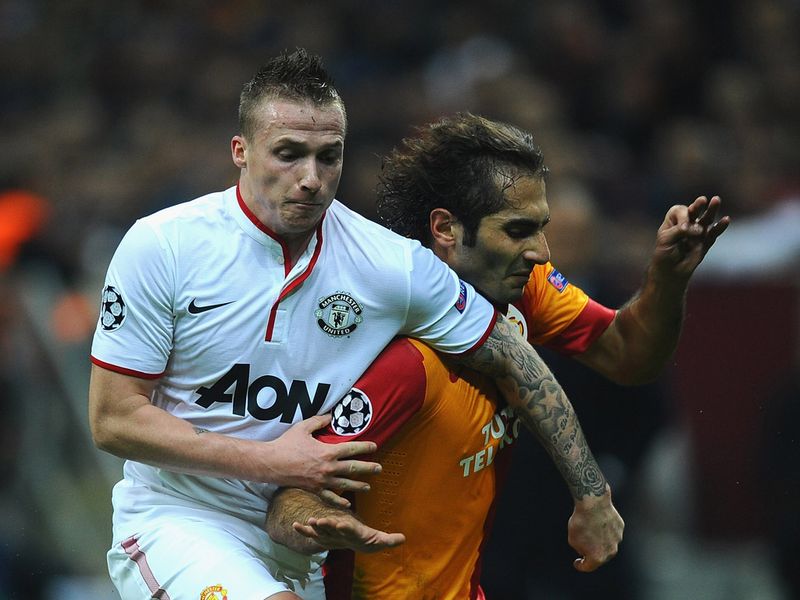 Alexander Buttner and Hamit Altintop battle for the ball