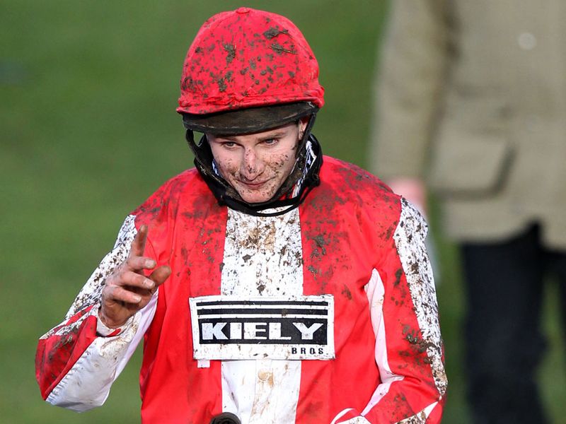 Jamie Moore returns to the winners' enclosure aboard Monbeg Dude