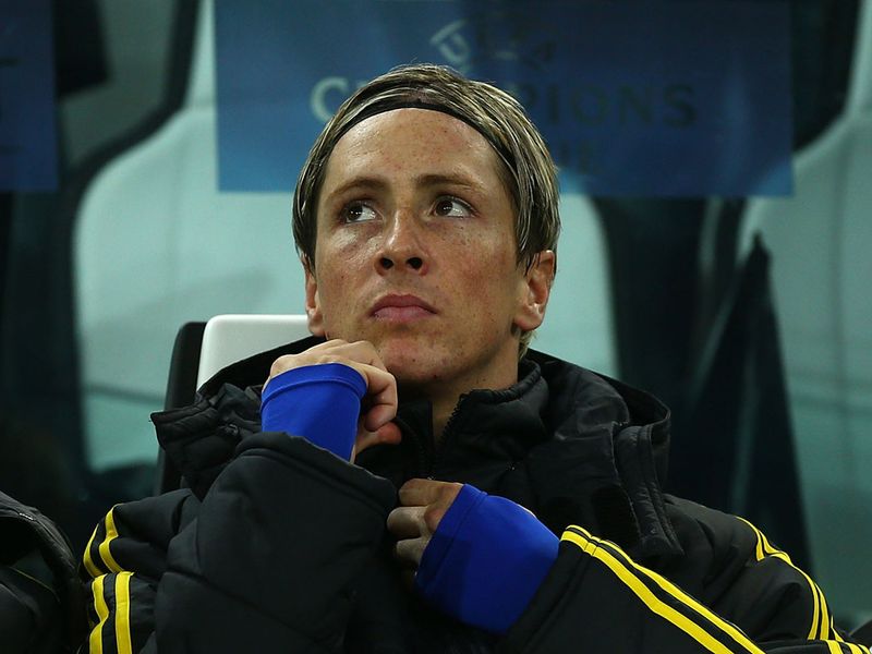 Fernando Torres watches on from the bench