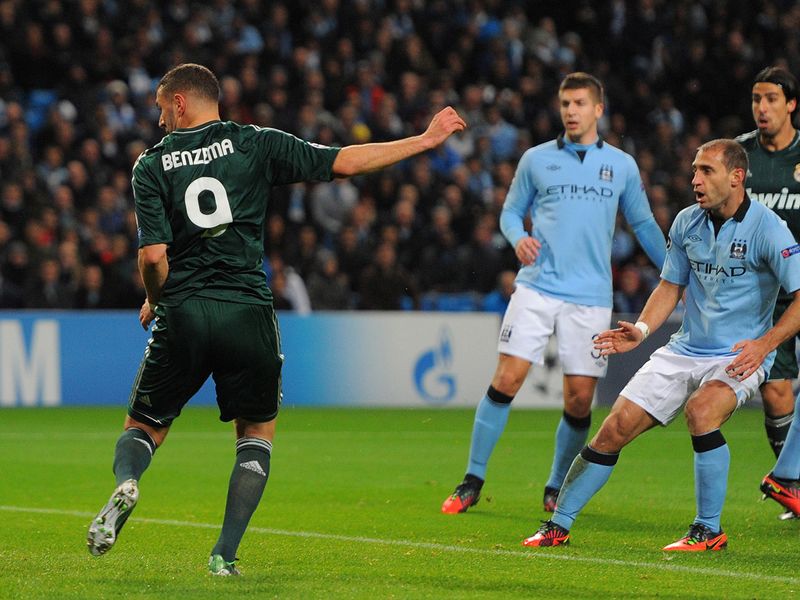 Man City's clash against Real Madrid gets off to a bad start when Karim Benzema sneaks in at the back post...