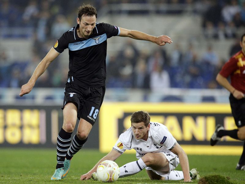 Libor Kozak and Gylfi Sigurdsson battle for the ball