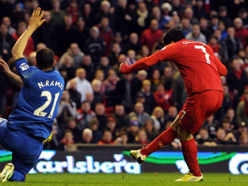 Liverpool take the lead against Wigan straight after half-time. Raheem Sterling gets in around the back and supplies Suarez who crashes the ball home.