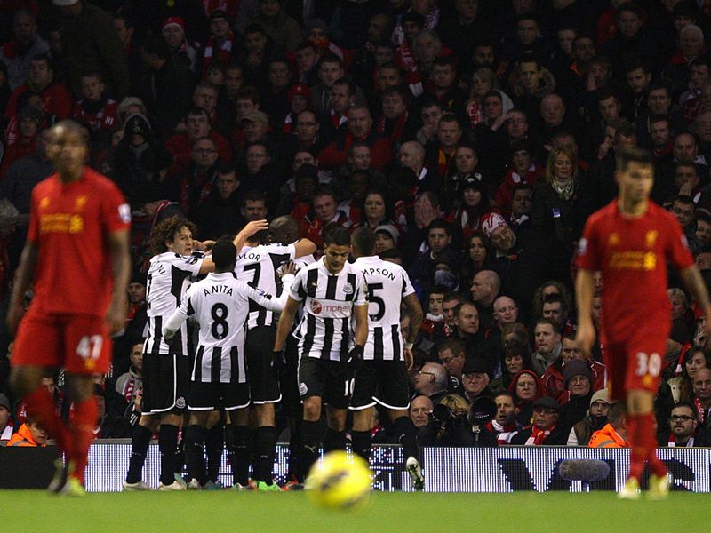 Newcastle celebrate after taking the lead just before half-time through Yohan Cabaye