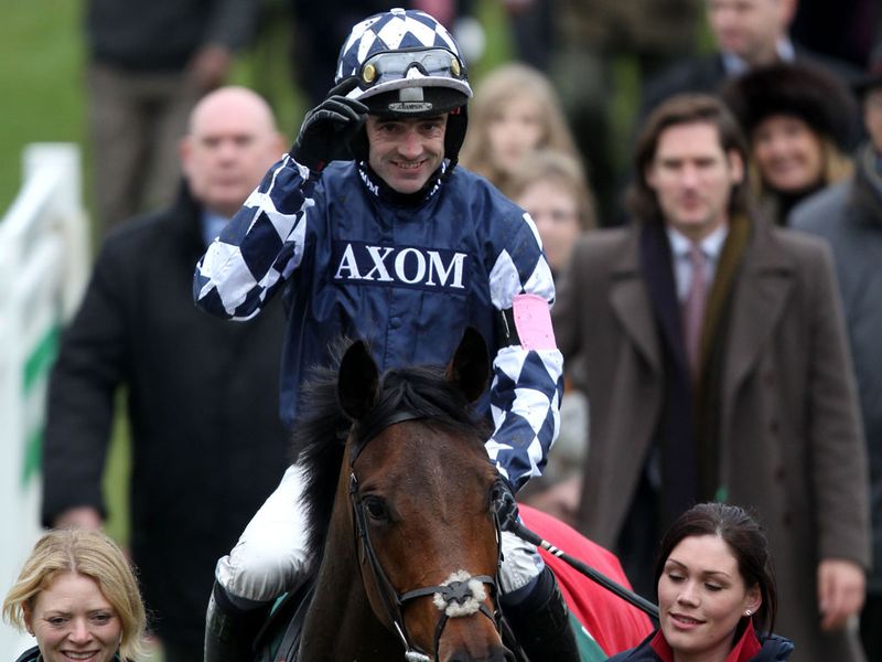 Ruby Walsh salutes the crowd after riding the winner of the first