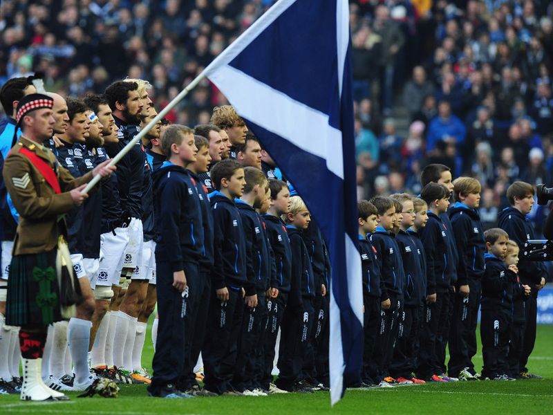 The sides line up for the national anthems and a minute's silence