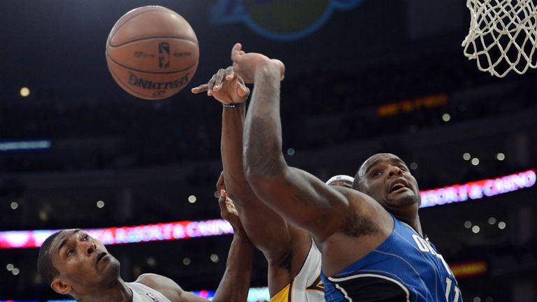 Orlando Magic's Glen Davis completes for the ball