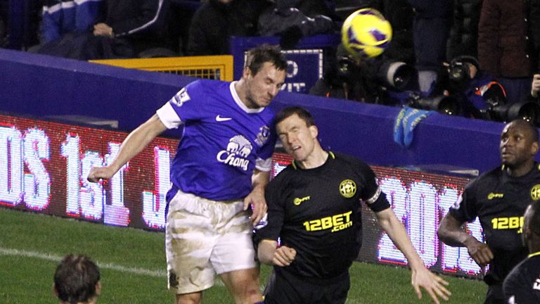 Phil Jagielka: Rises above Gary Caldwell to net what proved to be the winner