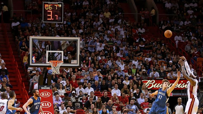 LeBron James shoots over Andrei Kirilenko during Miami's win over Minnesota