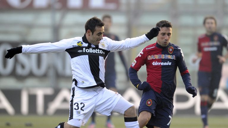 Marco Marchionni challenges Andrea Cossu